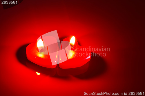 Image of Two red candles