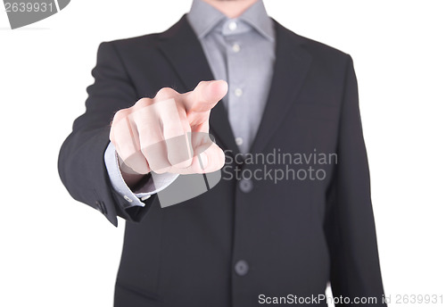 Image of Business man in suit pushing a button