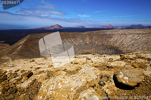 Image of vulcanic timanfaya  rock stone and summer in los volcanes lanzar