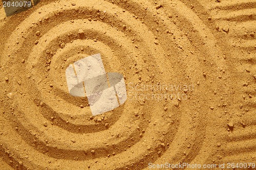 Image of circles in the sand