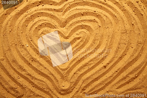Image of heart in the sand