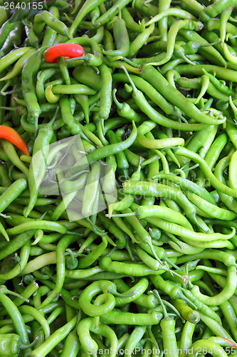 Image of lot of green chilli peppers