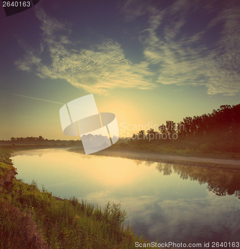 Image of sunrise over river - vintage retro style