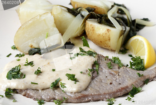 Image of Veal escalope with gravy and potatoes