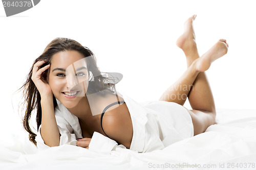 Image of Sexy woman lying on the bed