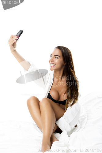 Image of Sexy woman taking a picture