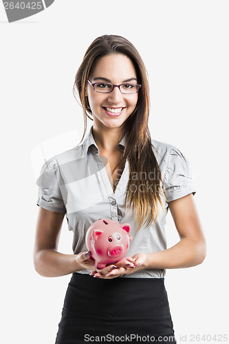 Image of Woman holding a piggy bank