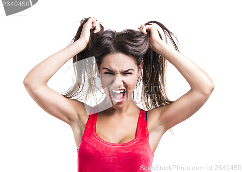 Image of Woman grabbing her hair