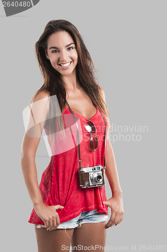 Image of Happy tourist with a old vintage camera