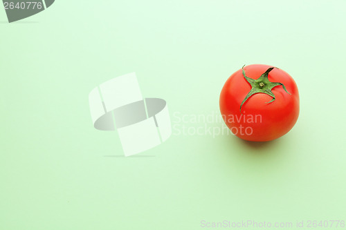 Image of Tomato with green background