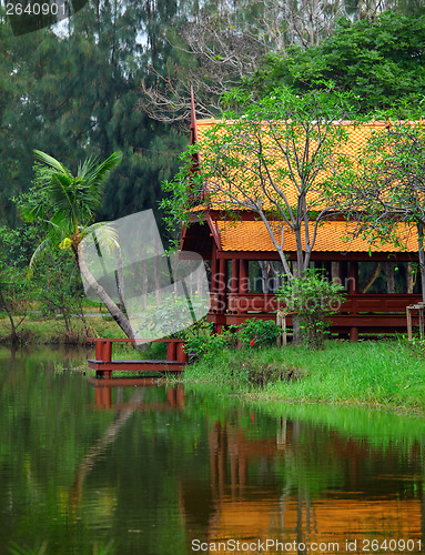 Image of Thai style pavilion with lake