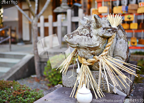 Image of Stone cow Statue in Japanese temple