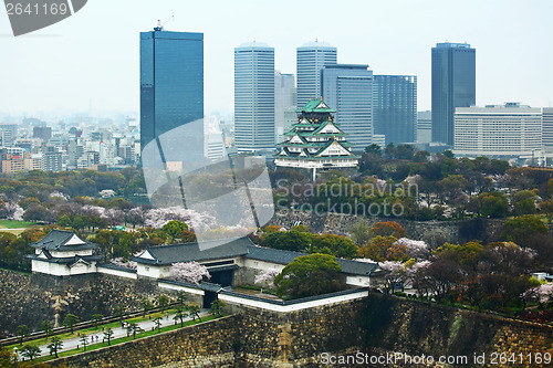 Image of Osaka cityscape with traditional castle