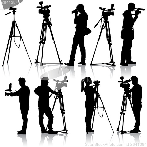 Image of Cameraman with video camera. Silhouettes on white background. Ve