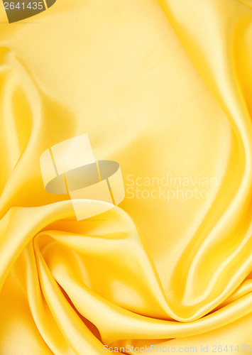 Image of Smooth elegant golden silk as background 