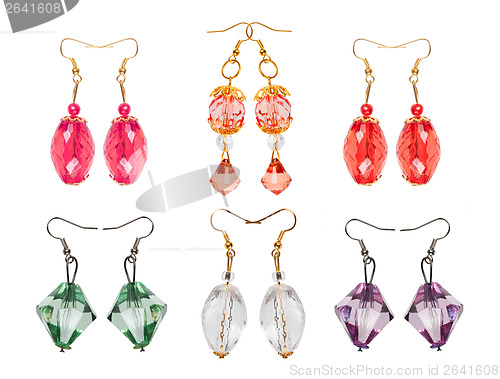 Image of Earrings made of glass on a white background. six pairs 