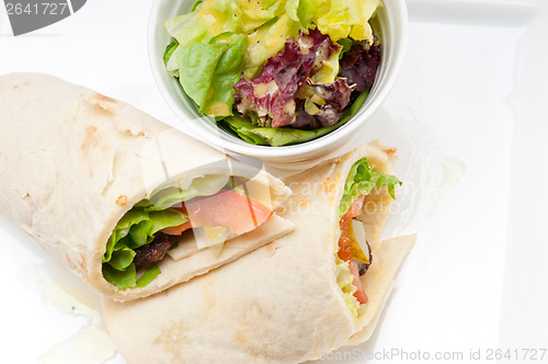 Image of kafta shawarma chicken pita wrap roll sandwich