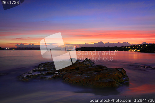 Image of Dawn glow of the sunrise at Edwards Beach