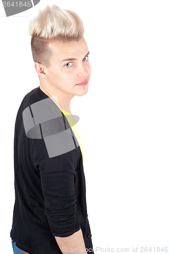 Image of Handsome man looking back over his shoulder