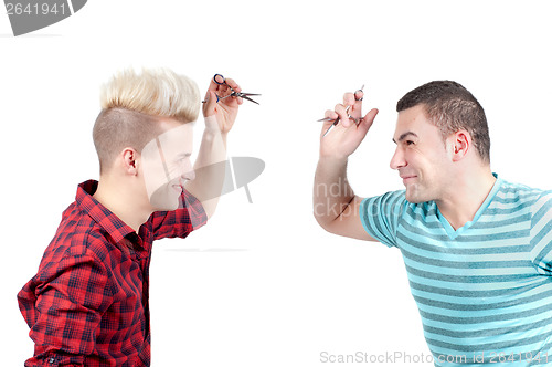 Image of Two men with scissors aiming each other