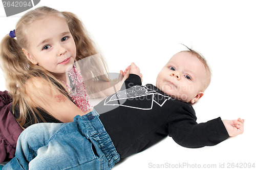 Image of Baby boy with sister
