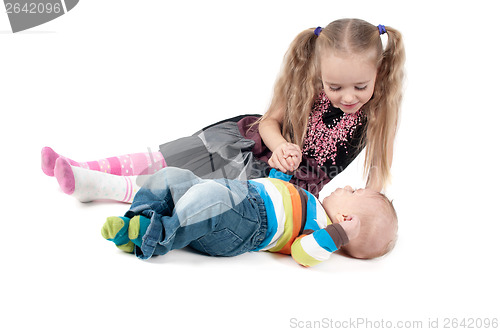 Image of Newborn baby boy with sister