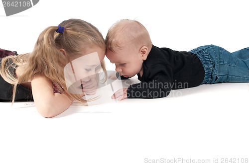 Image of Two children touching to each other's foreheads