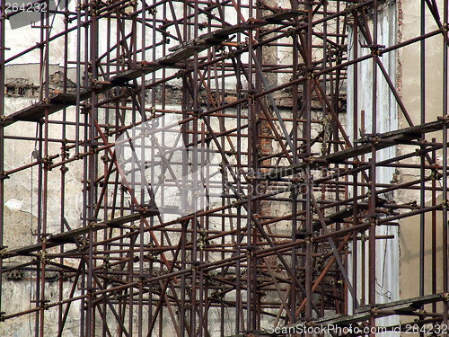 Image of Rusty old scaffolding construction