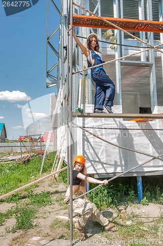 Image of Attractive women on construction site