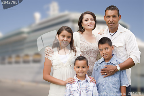 Image of Young Happy Hispanic Family In Front of Cruise Ship