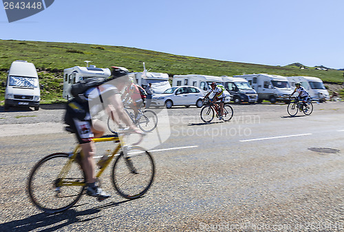 Image of Amateur Cyclists on the Road to Col de Pailheres