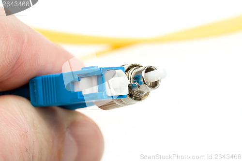 Image of blue fiber optic SC connector and FC type connector