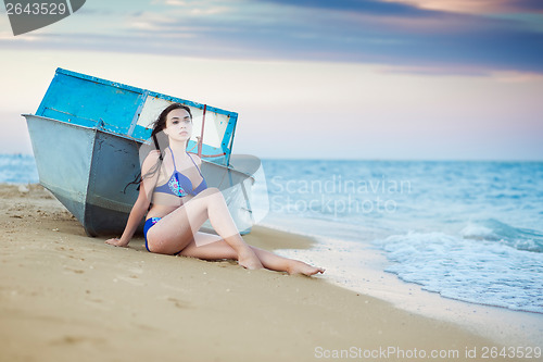 Image of Young thoughtful woman