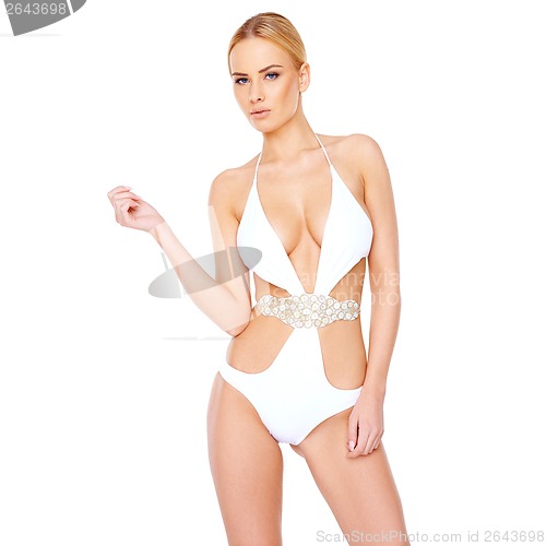 Image of Beautiful shapely woman in a white swimsuit