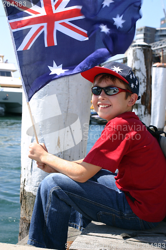 Image of Boy on harbourside pier