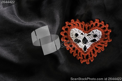 Image of Heart shape made of red textile