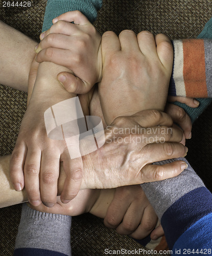 Image of Many hands together