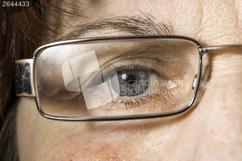 Image of Close up old women eye and glasses