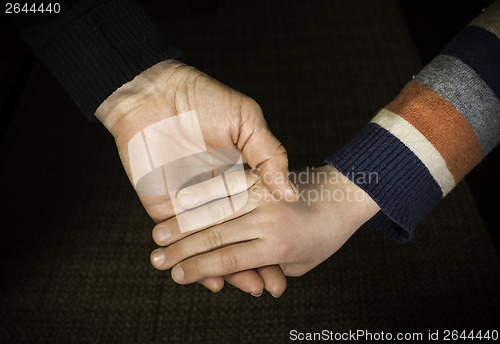 Image of Two hands caught