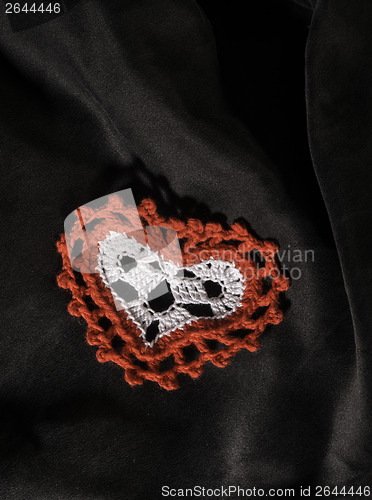 Image of Heart shape made of red textile