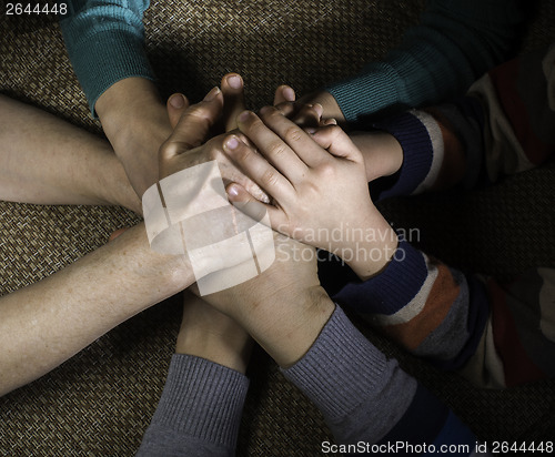 Image of Many hands together