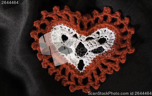 Image of Heart shape made of red textile