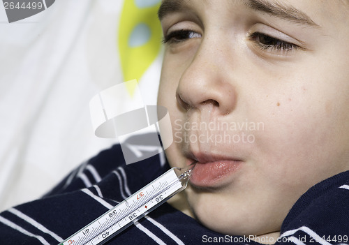 Image of Sick child in bed.