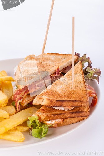 Image of Club sandwich with potato French fries