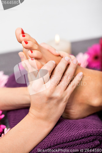 Image of Woman having a pedicure treatment at a spa