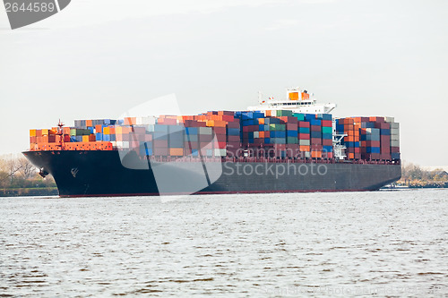 Image of Fully laden container ship in port