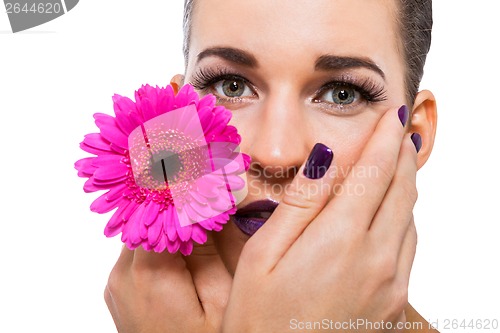 Image of Beautiful woman in purple make-up