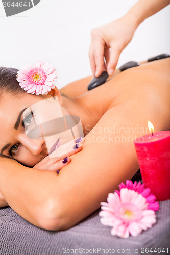 Image of Beautiful woman having a back massage