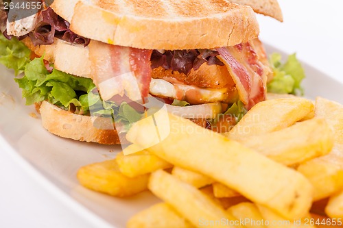 Image of Club sandwich with potato French fries