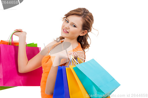 Image of Happy attractive young shopaholic